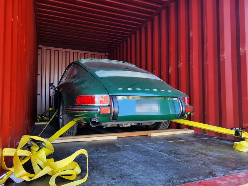 Classic vehicle secured for ocean transport