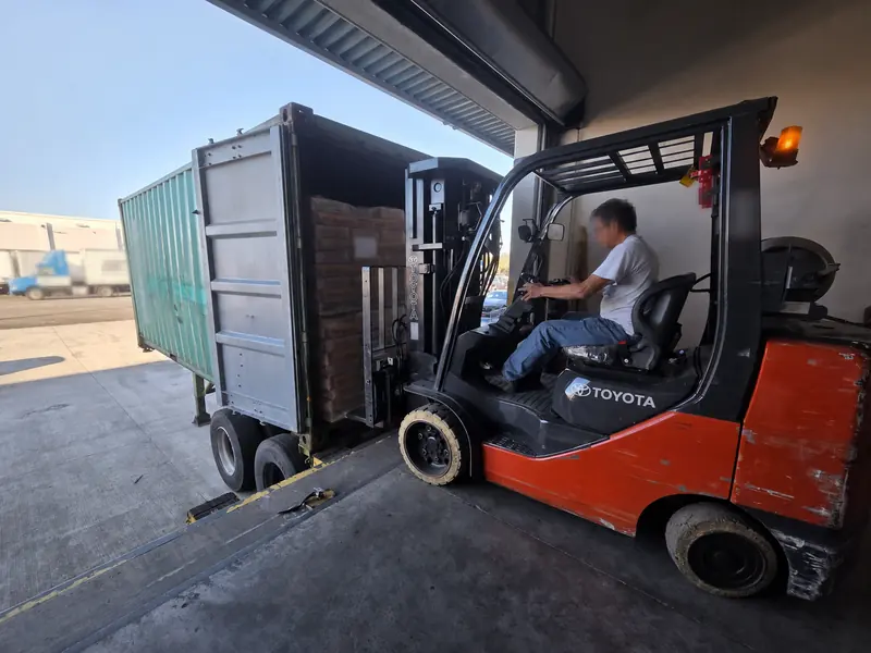 Container loading with specialized forklift handling