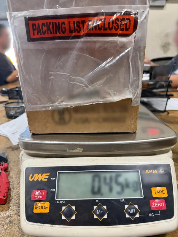 Parcel weight verification before dispatch